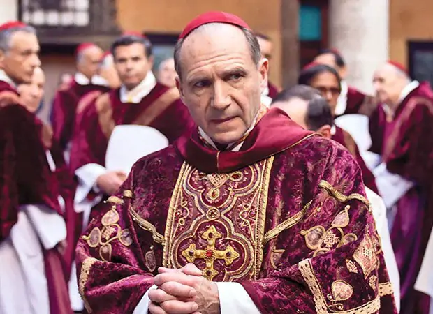 Peter Straughan calls Conclave a “Labor of Love” after 8 Oscar nominations; Ralph Fiennes applauds director Edward Berger