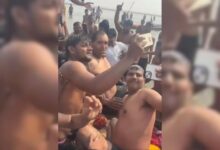 The great khali takes holy dip at maha kumbh. Devotees, Security Officials Start Selfie War. Watch