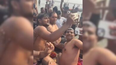 The great khali takes holy dip at maha kumbh. Devotees, Security Officials Start Selfie War. Watch